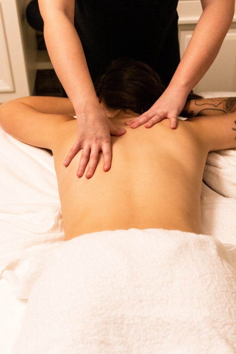 a woman getting a back massage